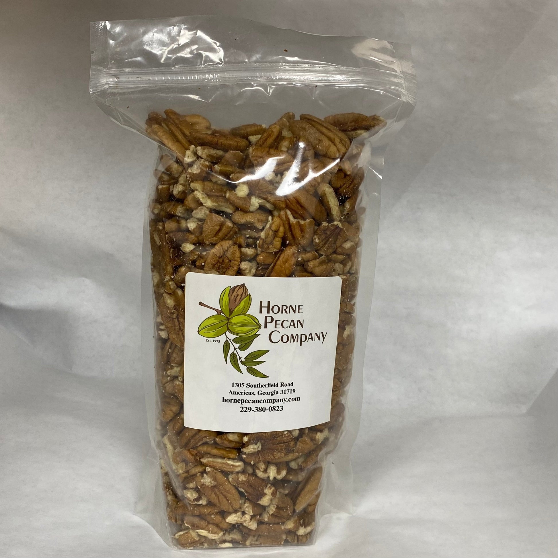 Bulk pecans from Horne Pecan Company, 2lb, 4lb, or 30lb bags, showing whole pecan halves in a natural, nutty display.