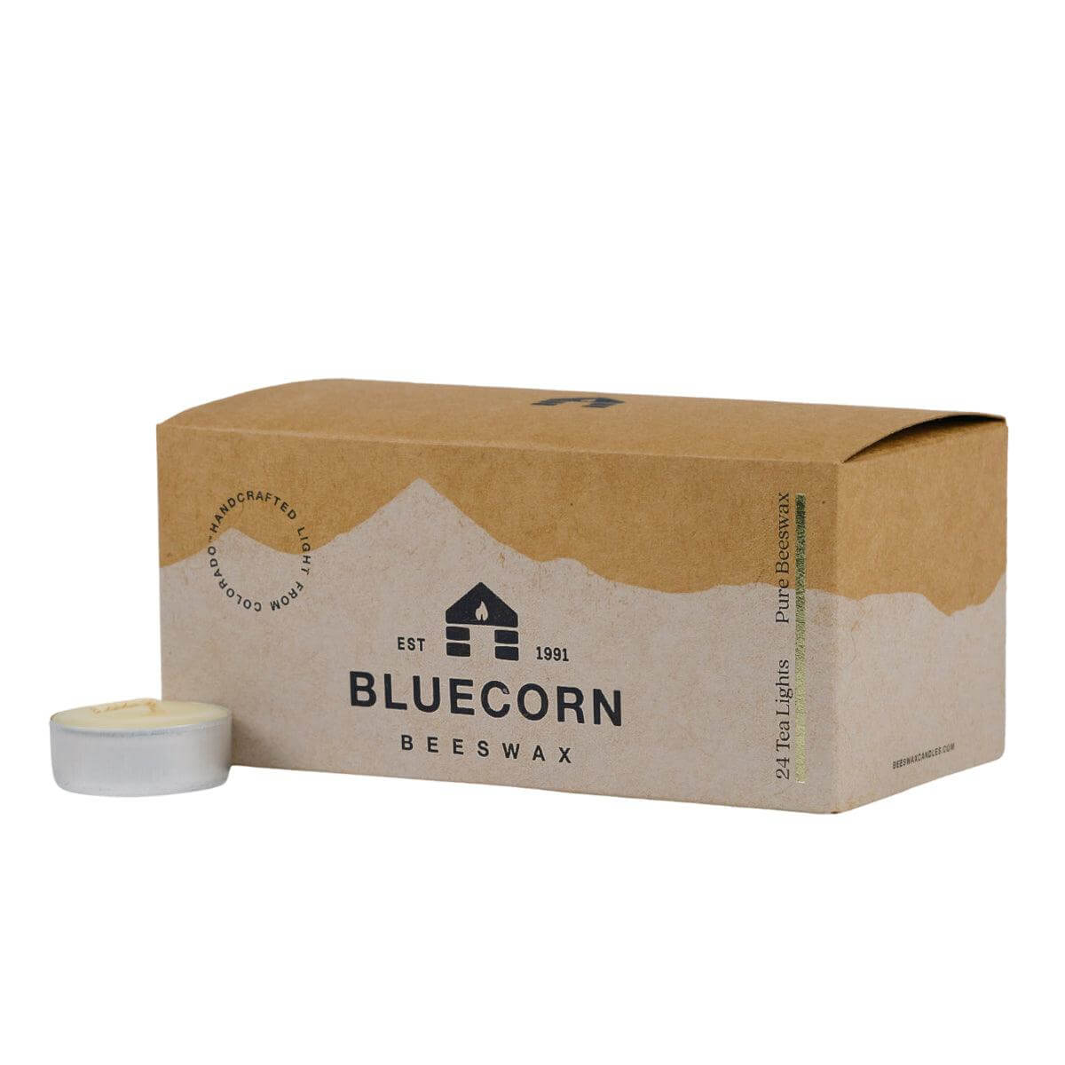 Bluecorn Candles pure beeswax tea light candles in small metal holders, showing warm, natural honey-colored wax and unlit flames.