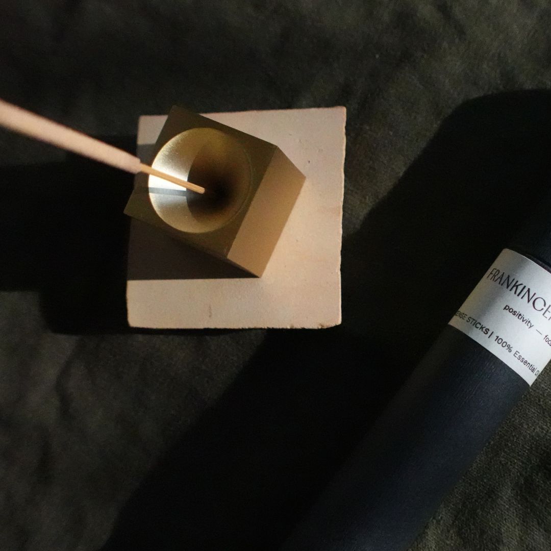 Tilley + Me essential oil incense sticks with a cube-shaped incense holder for aromatherapy and relaxation.
