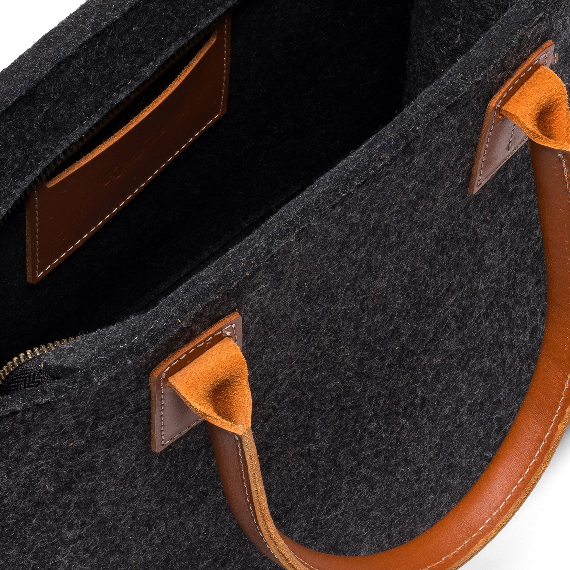 Charcoal Kyrgies handmade wool handbag with woven texture and sturdy handles, crafted for stylish everyday use.