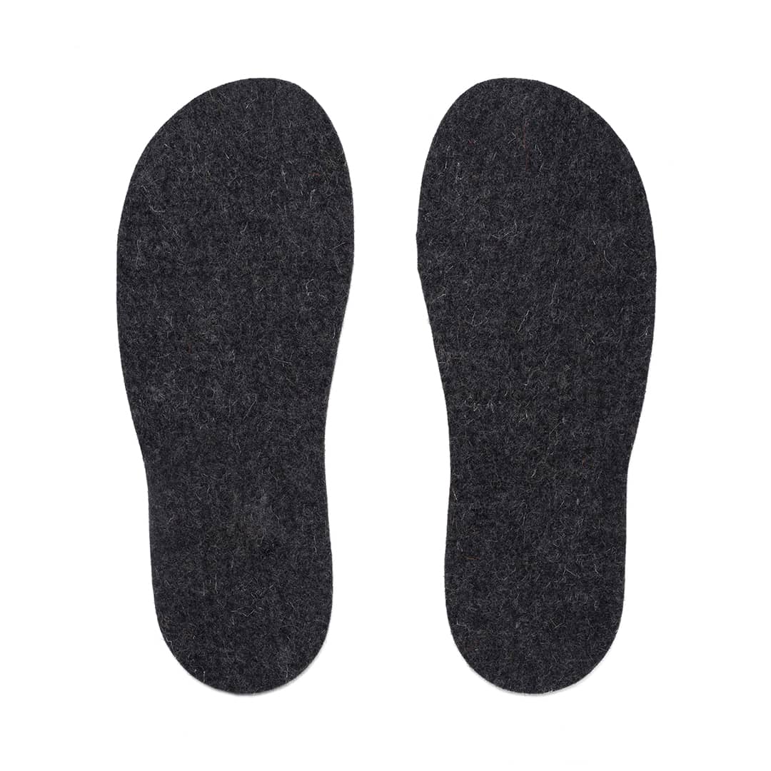Dark Kyrgies felt insoles for shoes, showing the soft, cushioned interior and sleek charcoal color.