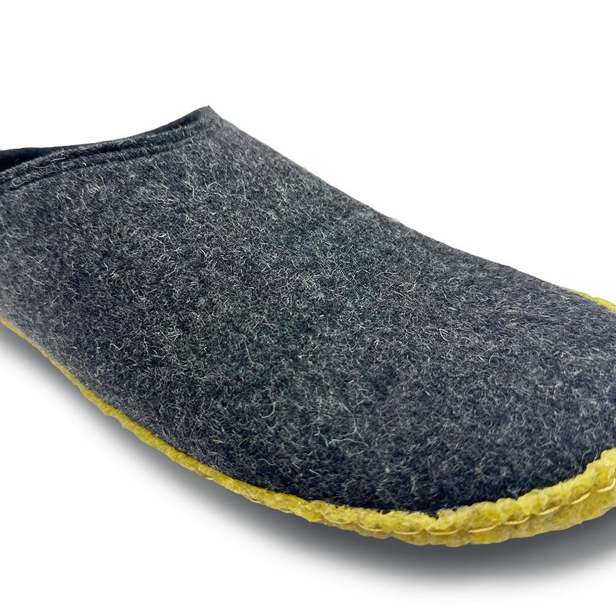 Kyrgies outdoor wool slides featuring cozy wool uppers and sturdy soles for comfortable outdoor wear.