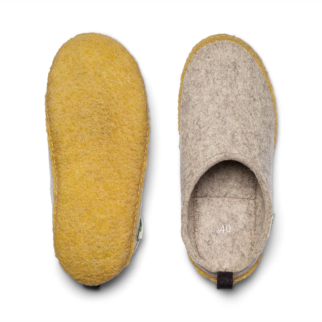 Kyrgies Outdoor Wool Slides in natural wool material, featuring a casual slip-on design suitable for outdoor wear.