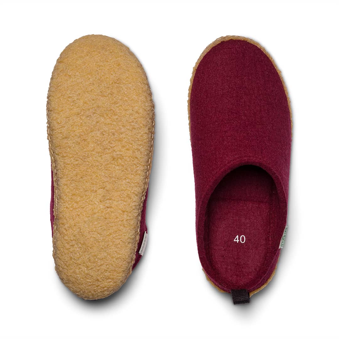 Kyrgies outdoor wool slides showing a cozy, textured wool upper with a flat outdoor sole, ideal for casual outdoor wear.