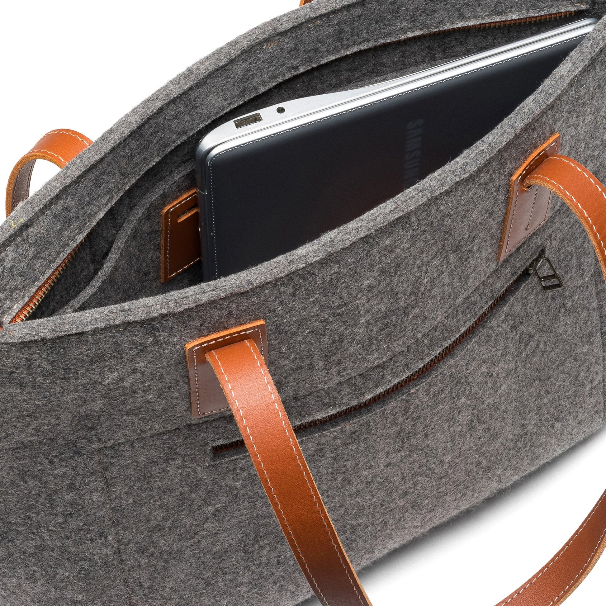 Gray Kyrgies handmade wool tote bag with sturdy handles and textured knit design, perfect for everyday use.