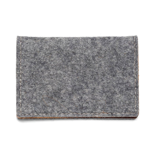 Gray felt and leather bifold wallet by Kyrgies, showing textured exterior and open interior with card slots.