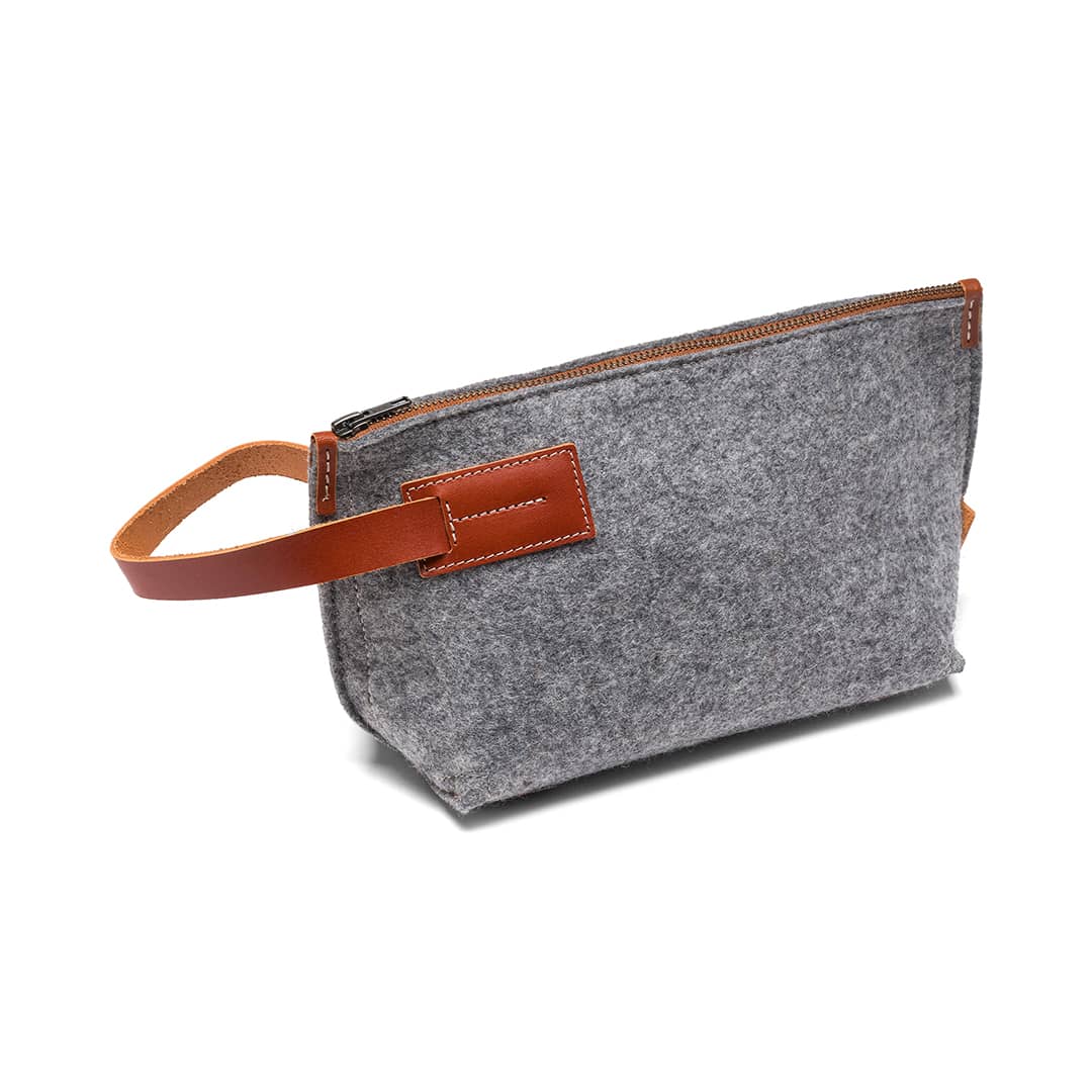 Gray felt and leather Kyrgies travel wallet with multiple compartments for organizing essentials.