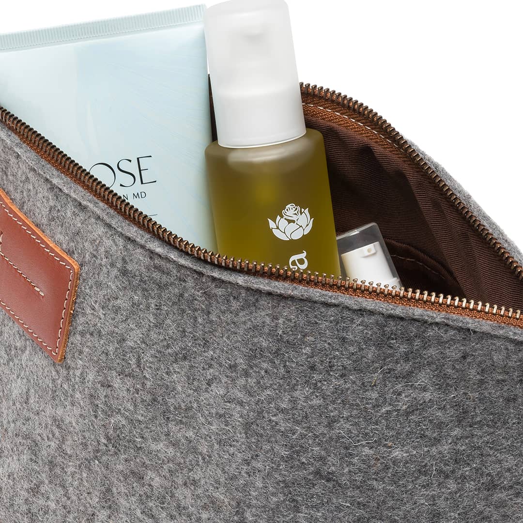 Gray felt and leather Kyrgies travel wallet with multiple compartments for organizing essentials.