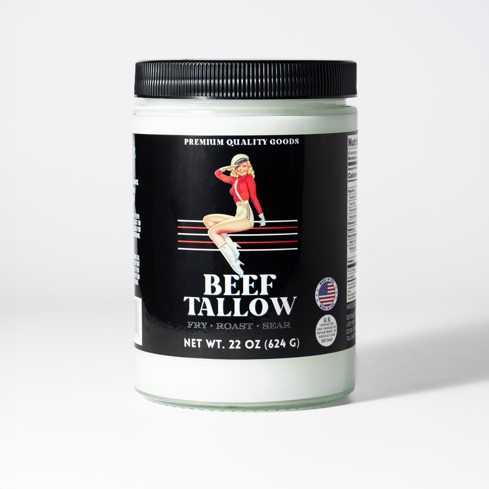 22oz jar of The Lady May premium grass-fed beef tallow, seed oil-free cooking fat, restaurant-quality beef tallow in a glass jar.