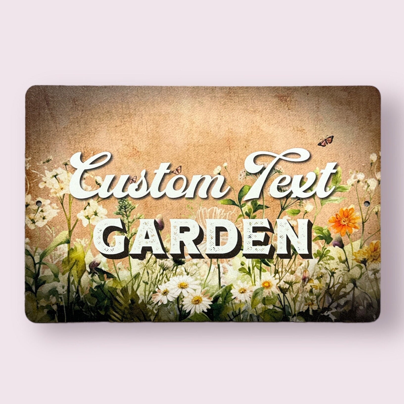 Custom aluminum garden name sign by Lewis Design Company, personalized outdoor metal sign for patio and garden decor.