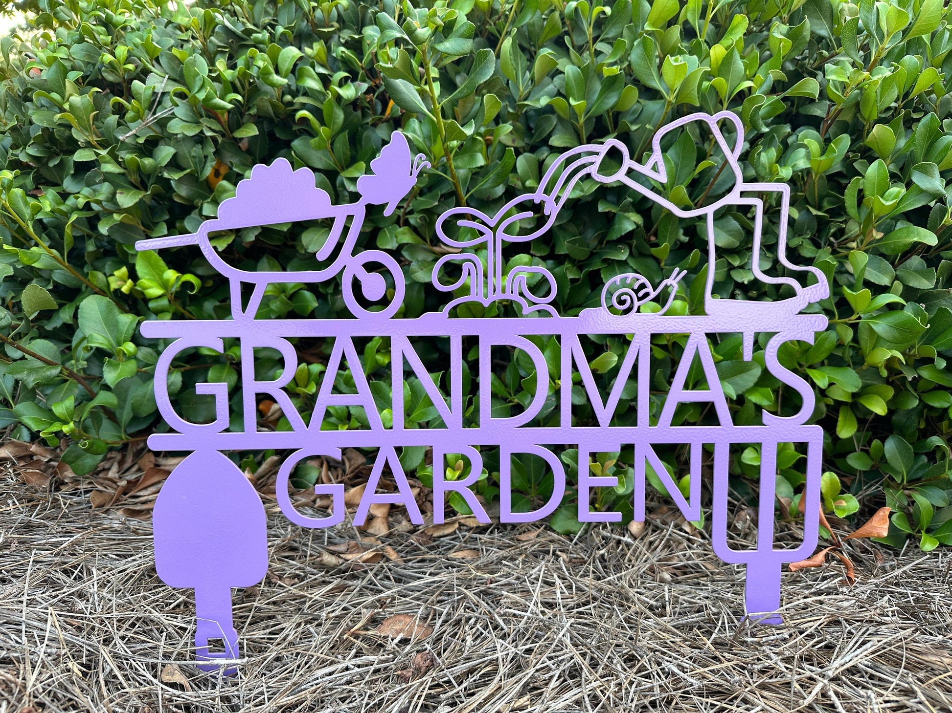 Black metal garden sign by Lewis Design Company, personalized outdoor patio and garden art, measuring 12x12 inches.