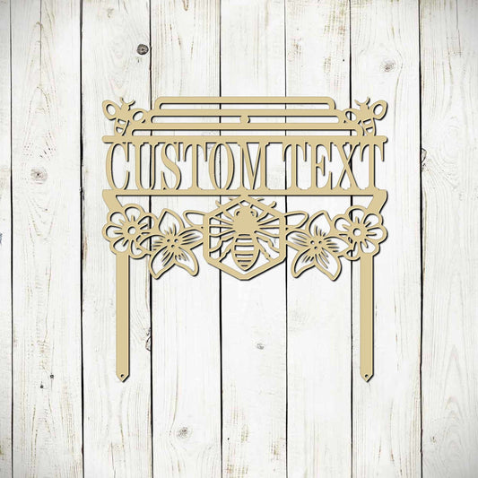 Black metal bee garden stake sign featuring a honey bee design, outdoor patio and garden art by Lewis Design Company.
