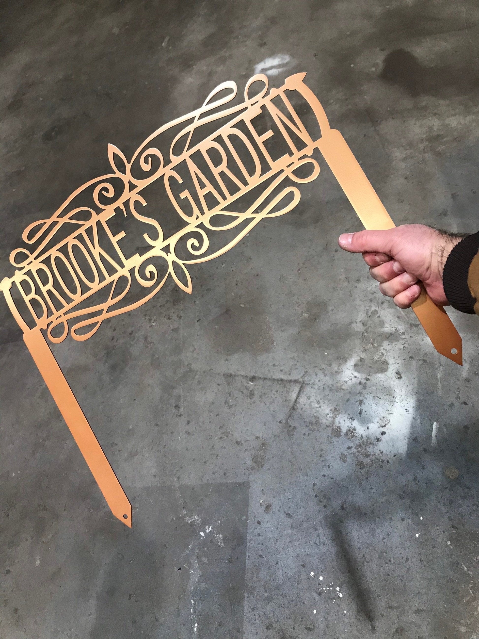 Black custom decorative garden sign by Lewis Design Company, outdoor patio and garden art, 15x13 inches, suitable for outdoor decor