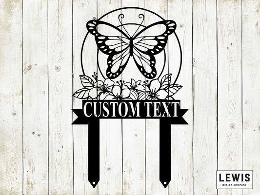 Black metal butterfly garden stake by Lewis Design Company, outdoor patio and garden art for decorative yard display.