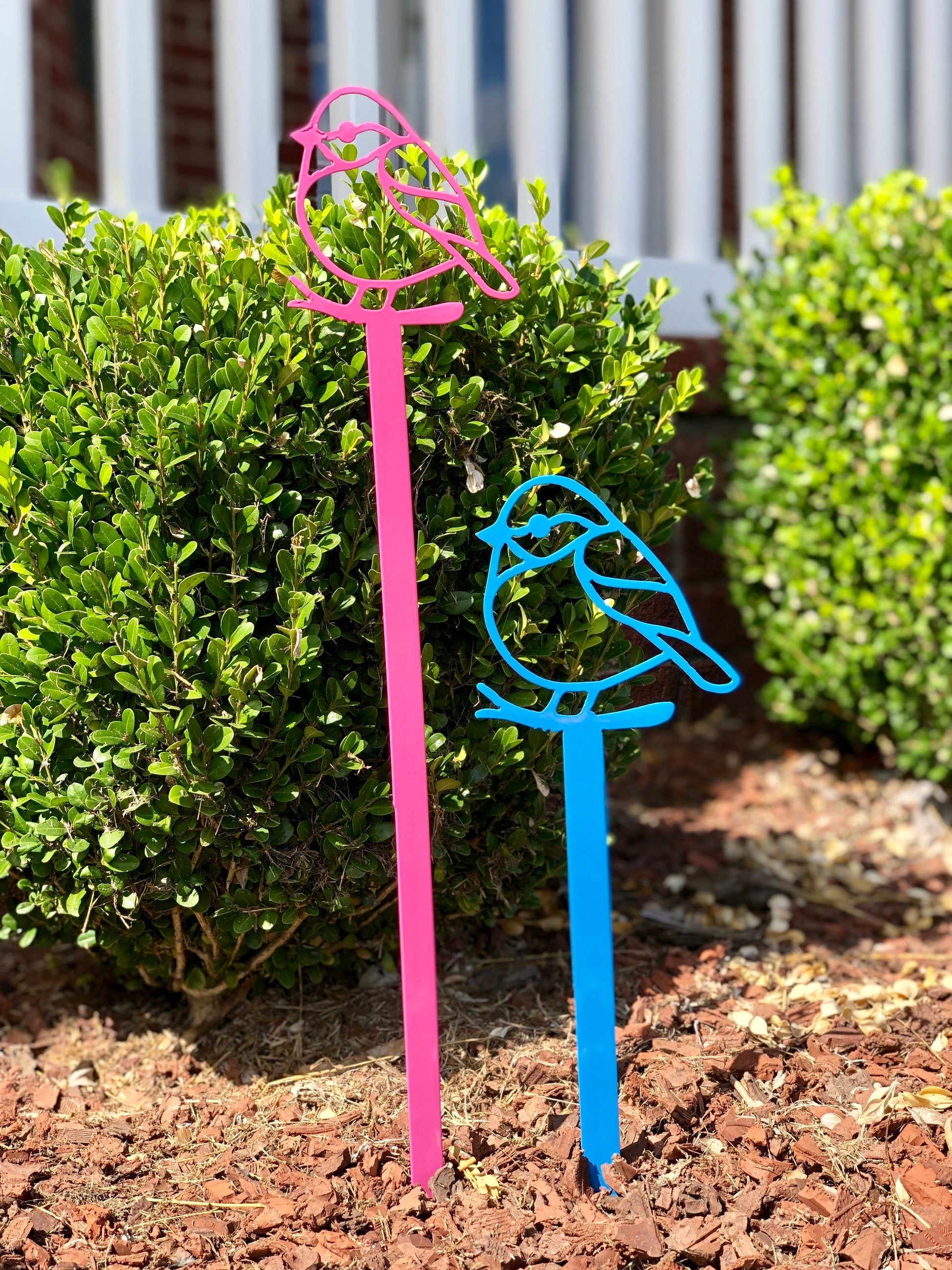 Handmade black bird yard sign from Lewis Design Company, outdoor garden and patio art for yard decoration.