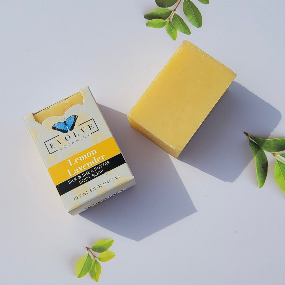 Evolve Botanica Lemon Lavender Silk specialty soap bar with lemon and lavender scent, wrapped in elegant packaging.