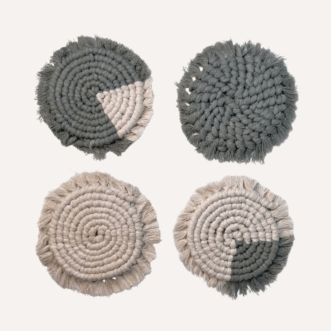 Set of four handmade macrame coasters by Tilley + Me featuring olive-green boho-style drink mats for table decor.