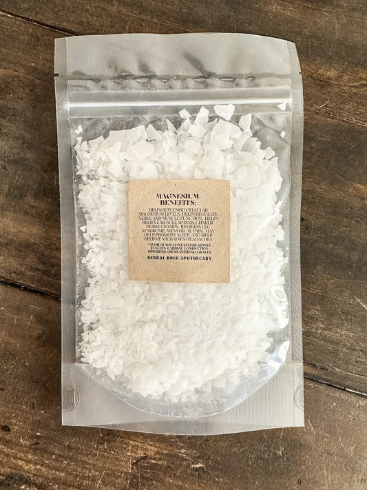 Herbalroseapothecary magnesium flakes salts and oats package with label showing ingredients and product details.