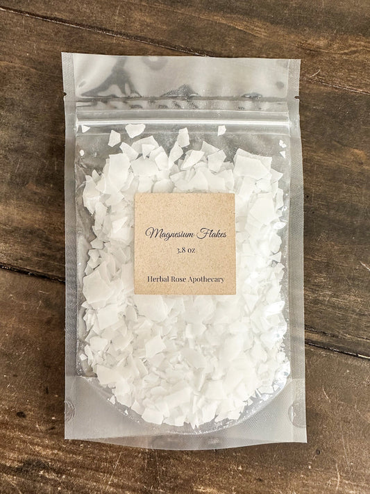 HerbalRoseApothecary magnesium flakes labeled front, natural salts and oats bath salts in clear packaging
