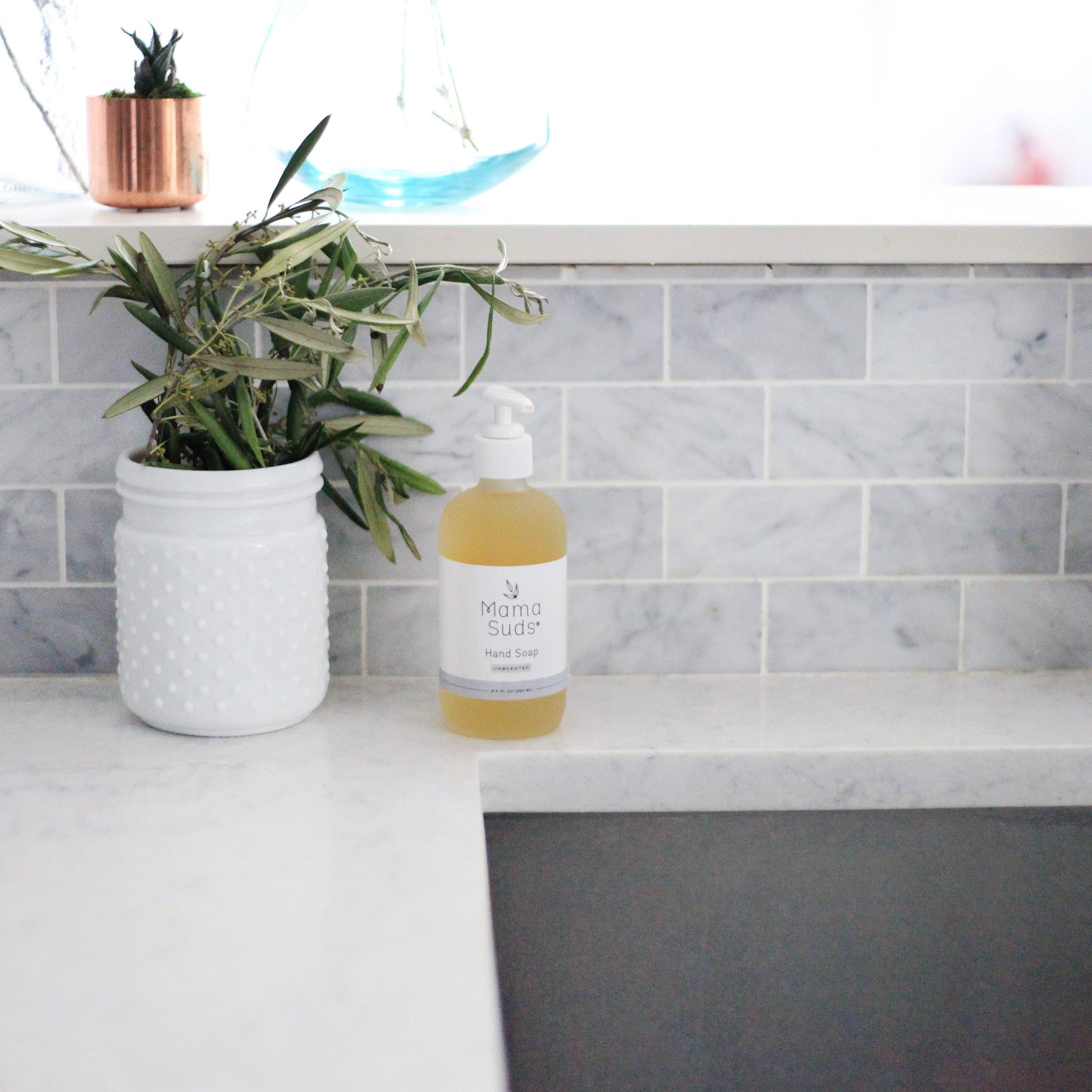 Unscented MamaSuds hand soap in an 8-fluid-ounce pump bottle, designed for effective household cleaning and handwashing.