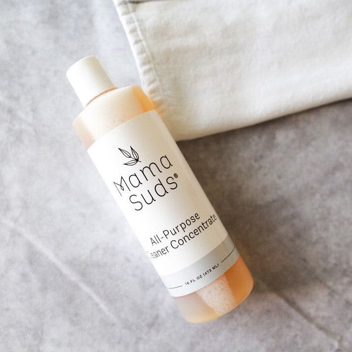 MamaSuds All-Purpose Cleaner Concentrate for household cleaning, shown in a clear bottle with a pump dispenser.