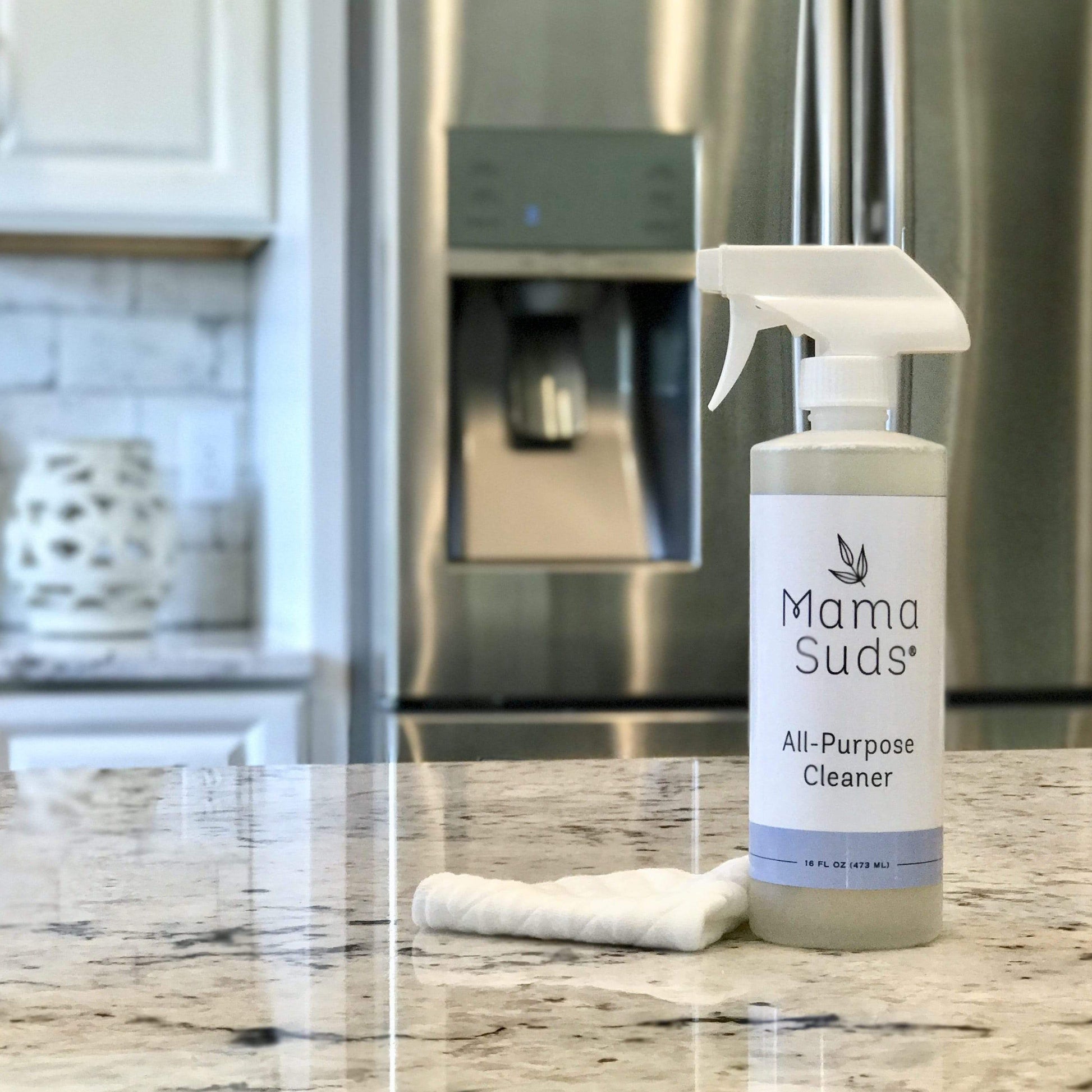 MamaSuds all-purpose cleaner spray bottle, household cleaning product for versatile surface cleaning and sanitizing.