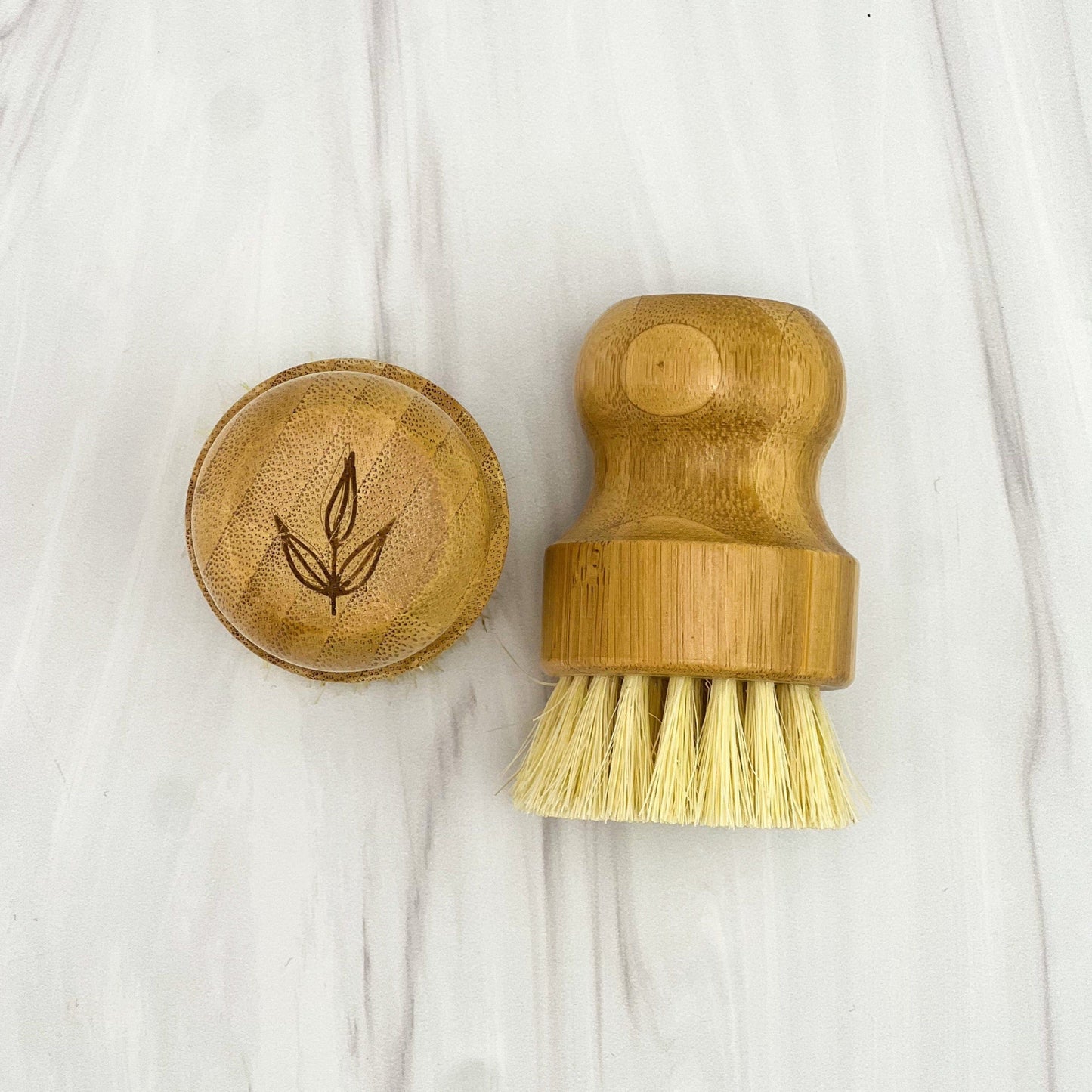 MamaSuds bamboo pot brush with wooden handle, ideal for cleaning pots and pans in household kitchen cleaning tasks.
