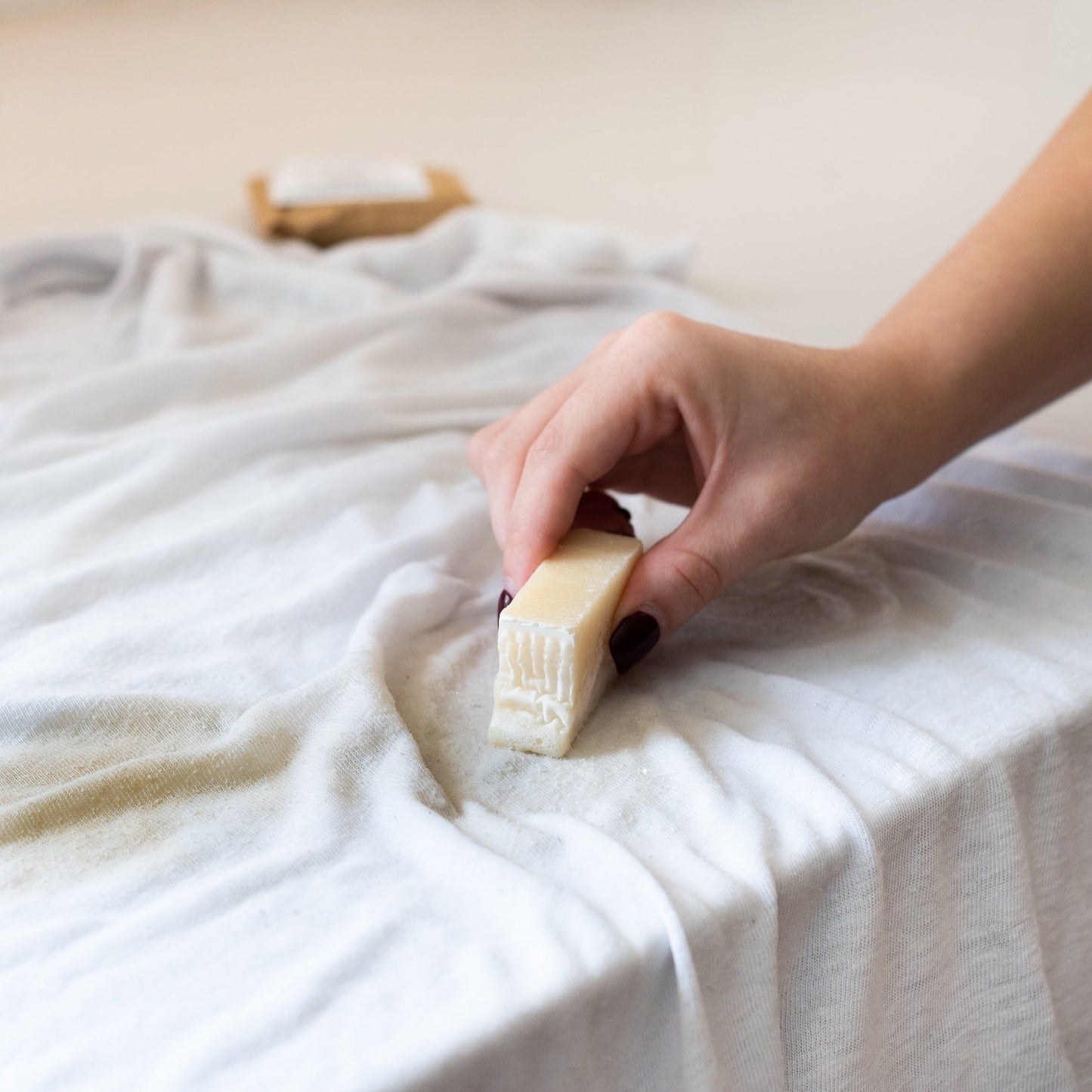 MamaSuds laundry stain stick for removing tough stains from clothing, compact household cleaning product.