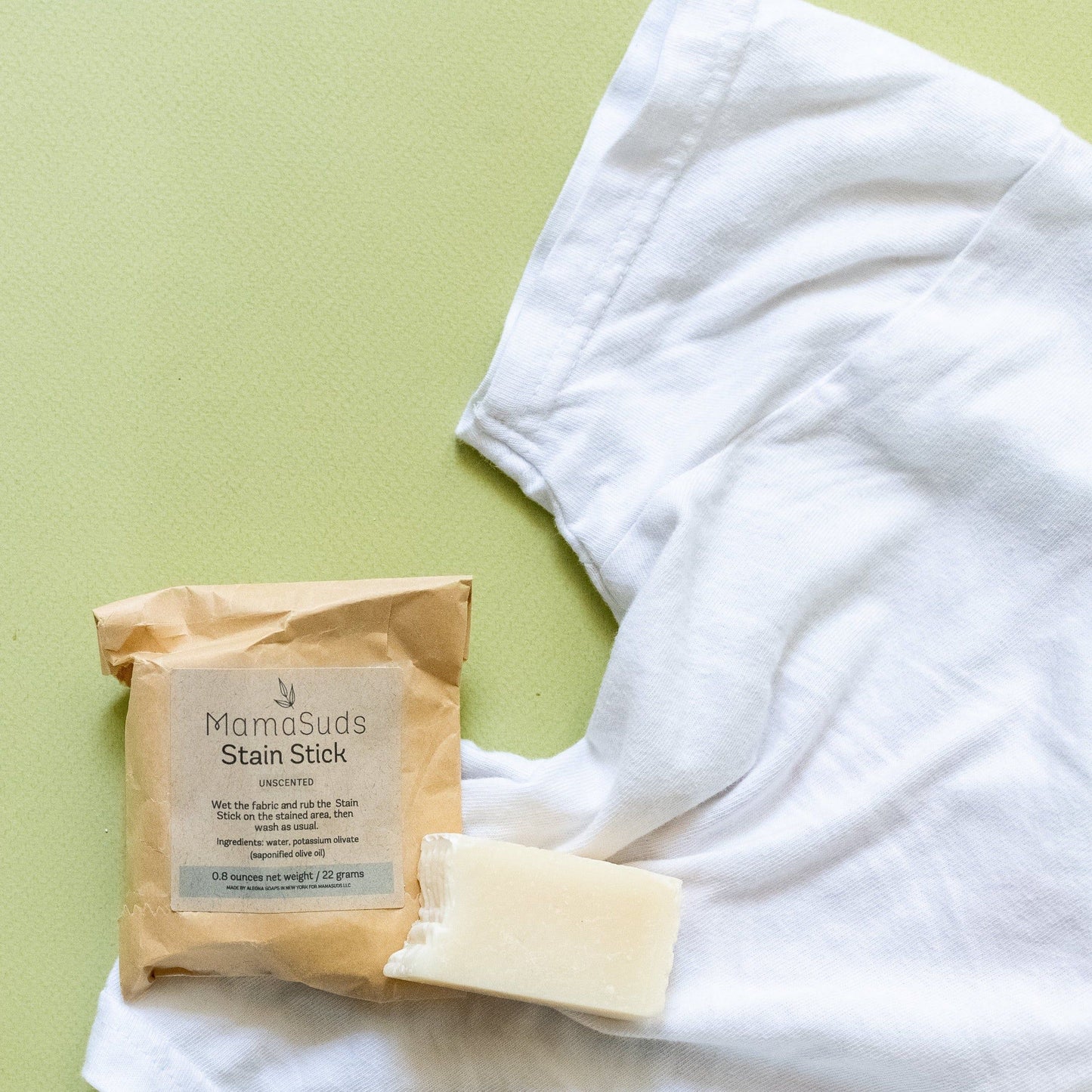 MamaSuds laundry stain stick for removing tough stains from clothing, handheld household cleaning product.