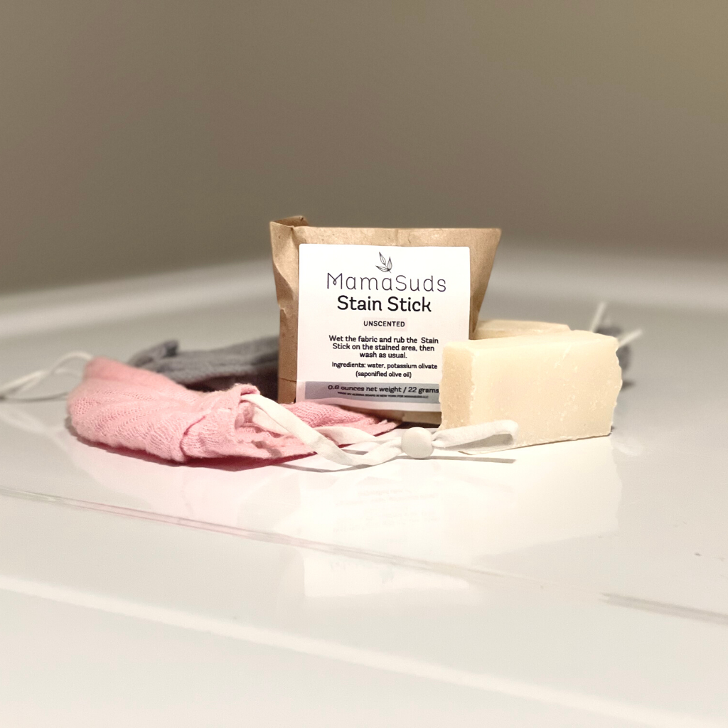 MamaSuds laundry stain stick for removing tough stains from clothing, portable household cleaning product with easy application.