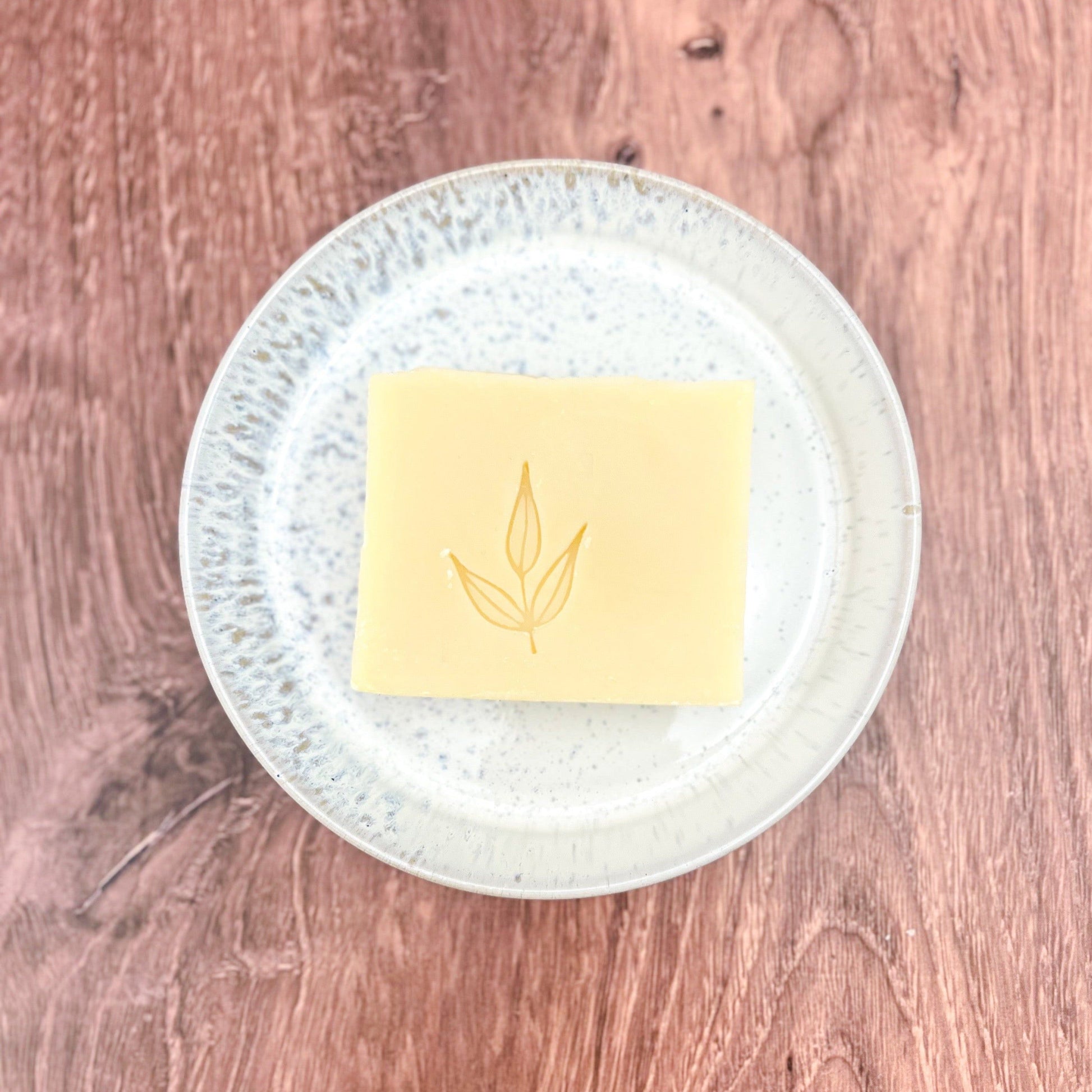 MamaSuds solid dish soap bar for household cleaning, showing a natural, eco-friendly soap product in a clean setting.