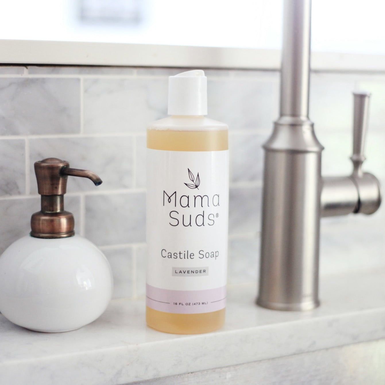 Unscented MamaSuds Castile Liquid Soap in a 16 fl oz bottle, natural household cleaning product with gentle, plant-based ingredients.