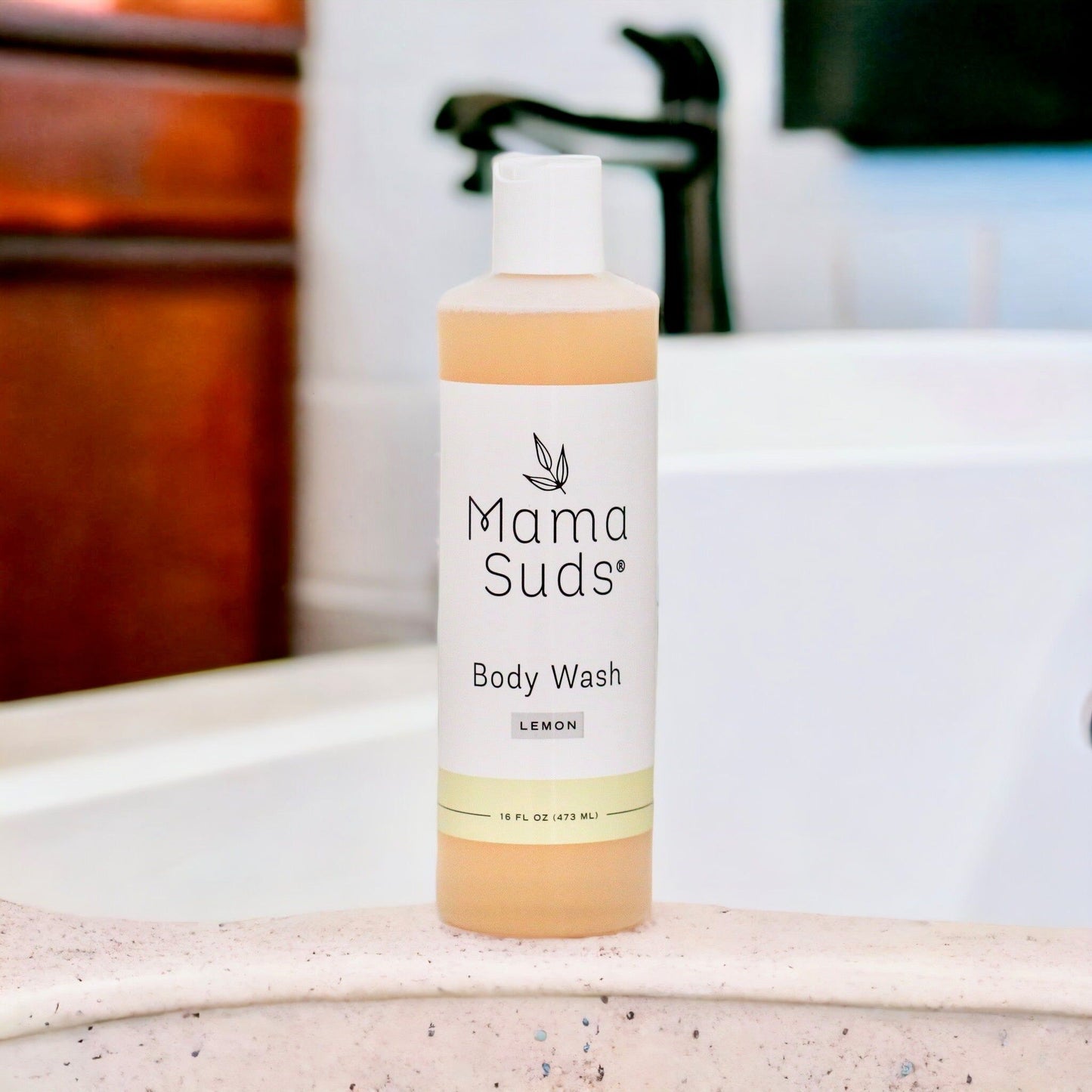 Unscented MamaSuds body wash soap in a clear bottle, designed for household cleaning and gentle skin cleansing.
