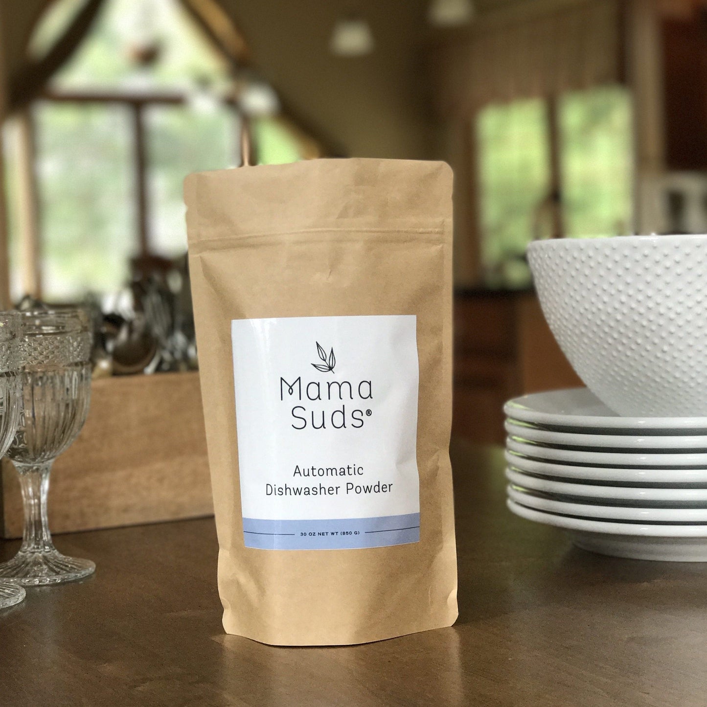 MamaSuds automatic dishwasher powder for household cleaning, eco-friendly and non-toxic dishwasher detergent in a recyclable container.