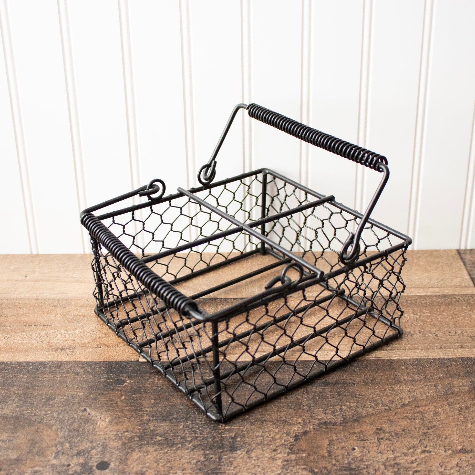 Chicken Wire Caddy for 4 Pint Mason Jars from Mason Jar Lifestyle, showing a rustic wire holder with four glass jars.