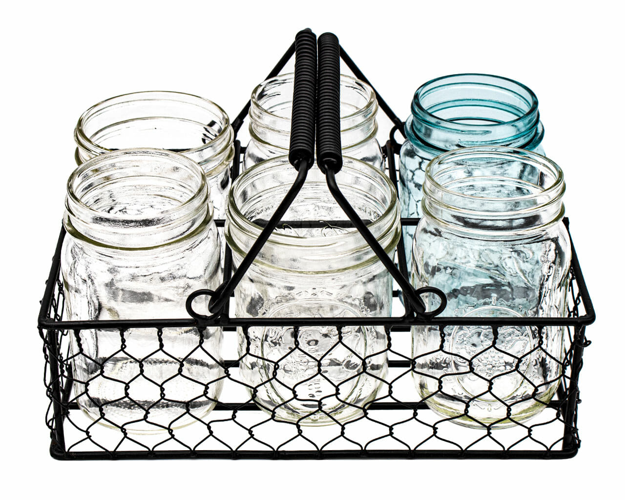 Chicken wire caddy holding six pint Mason jars from Mason Jar Lifestyle, designed for easy transport and storage.