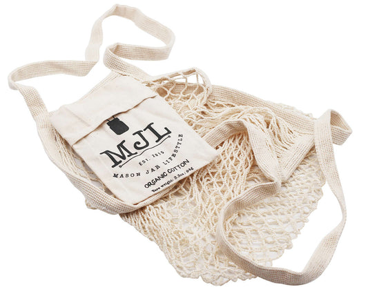Organic cotton string tote bag with front pocket from Mason Jar Lifestyle, showing its natural fabric and spacious design.