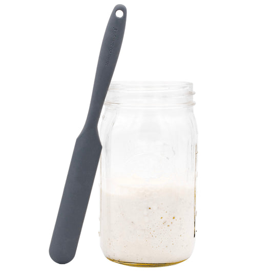 Silicone jar scraper from Mason Jar Lifestyle with a flexible, durable design for easy cleaning of jars and containers.