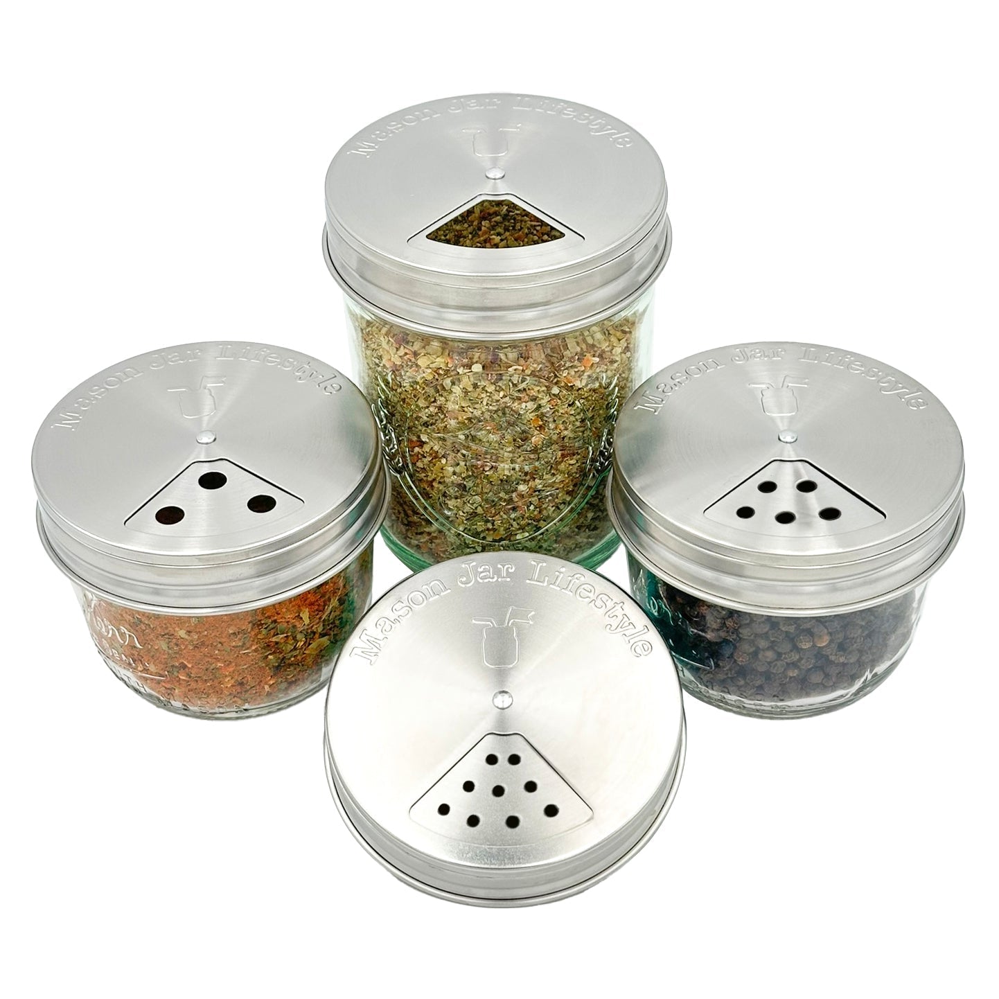 Set of four stainless steel spice shaker lids for mason jars, compatible with regular-mouth Mason jars, suitable for home and garden use.