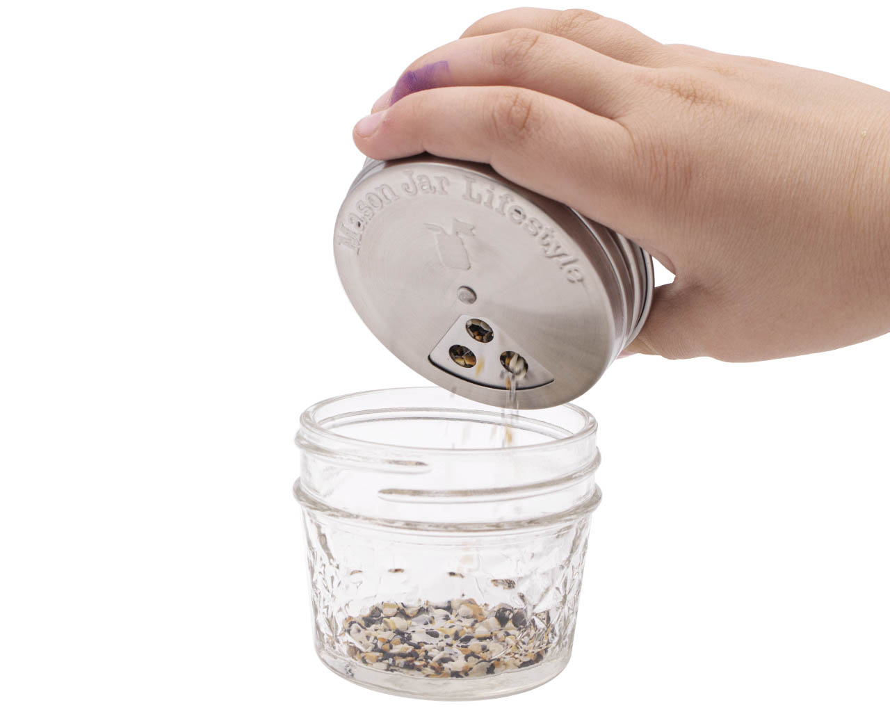 Set of four stainless steel spice shaker lids for Mason jars, compatible with regular-mouth jars, by Mason Jar Lifestyle.