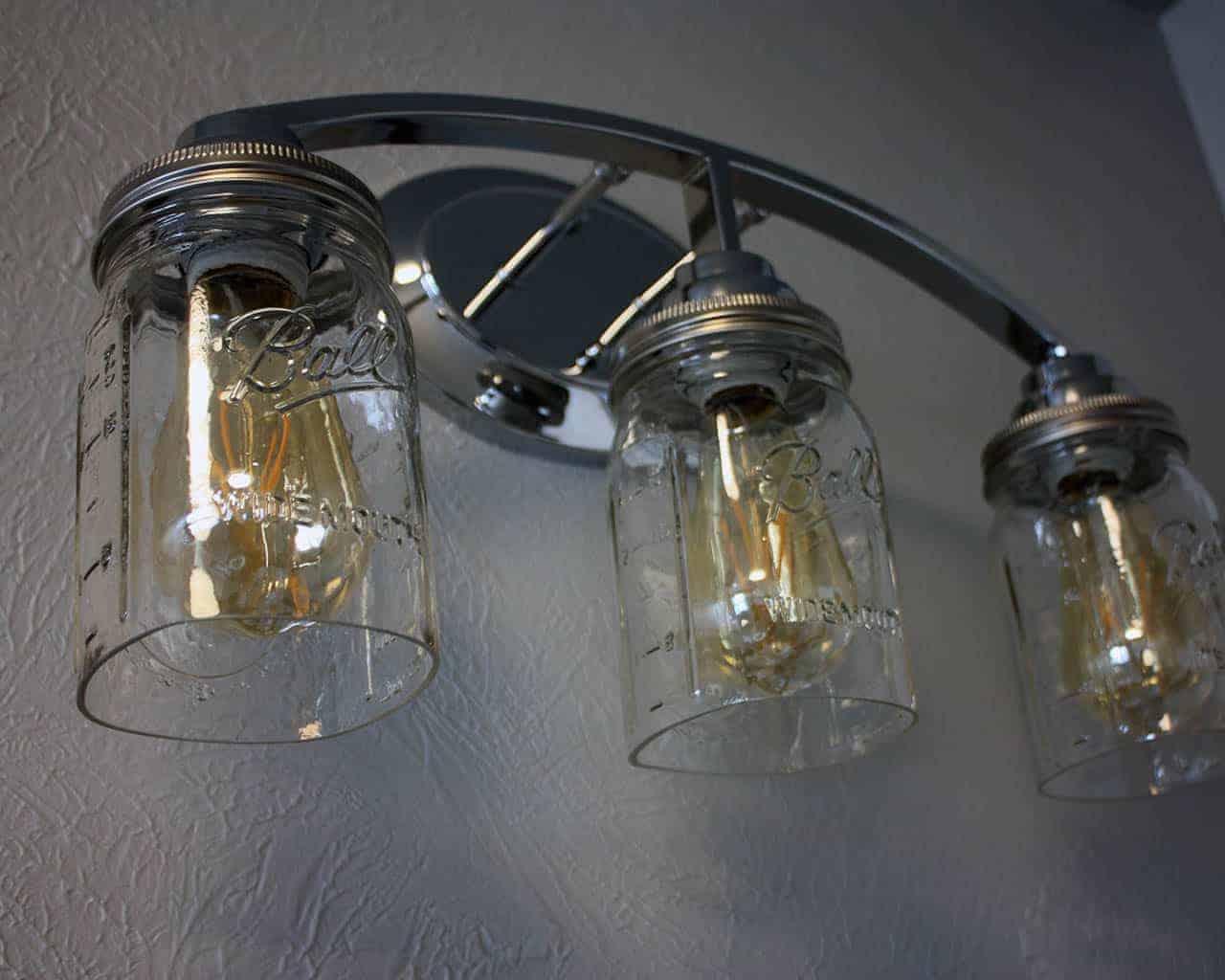 Stainless steel lighting lid for mason jar light fixtures, designed for regular-mouth mason jars by Mason Jar Lifestyle.