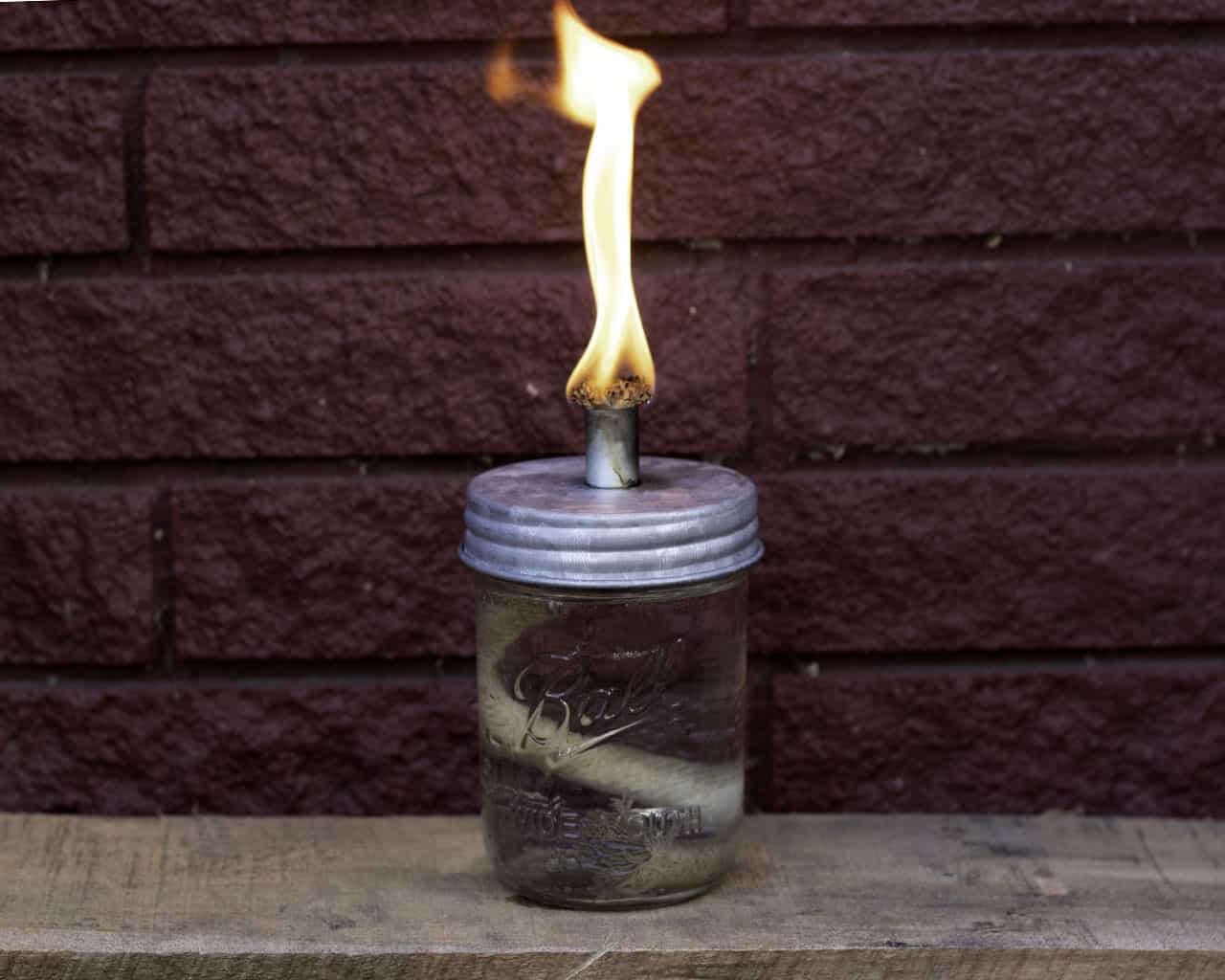 Galvanized metal lid for mason jar tiki torch oil lamp, designed for regular-mouth Mason jars, by Mason Jar Lifestyle.