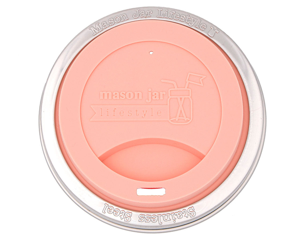 Mason Jar Lifestyle silicone drinking lid with stainless steel band on a wide-mouth mason jar in light coral, eco-friendly zero waste starter kit