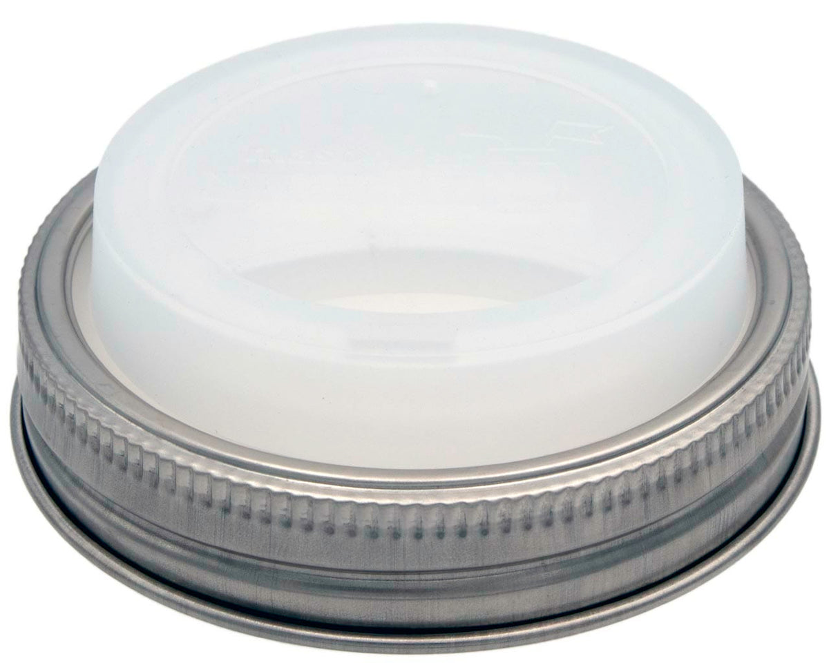 Wide-mouth Mason jar with silicone drinking lid and stainless steel band, part of Mason Jar Lifestyle's zero waste starter kit.