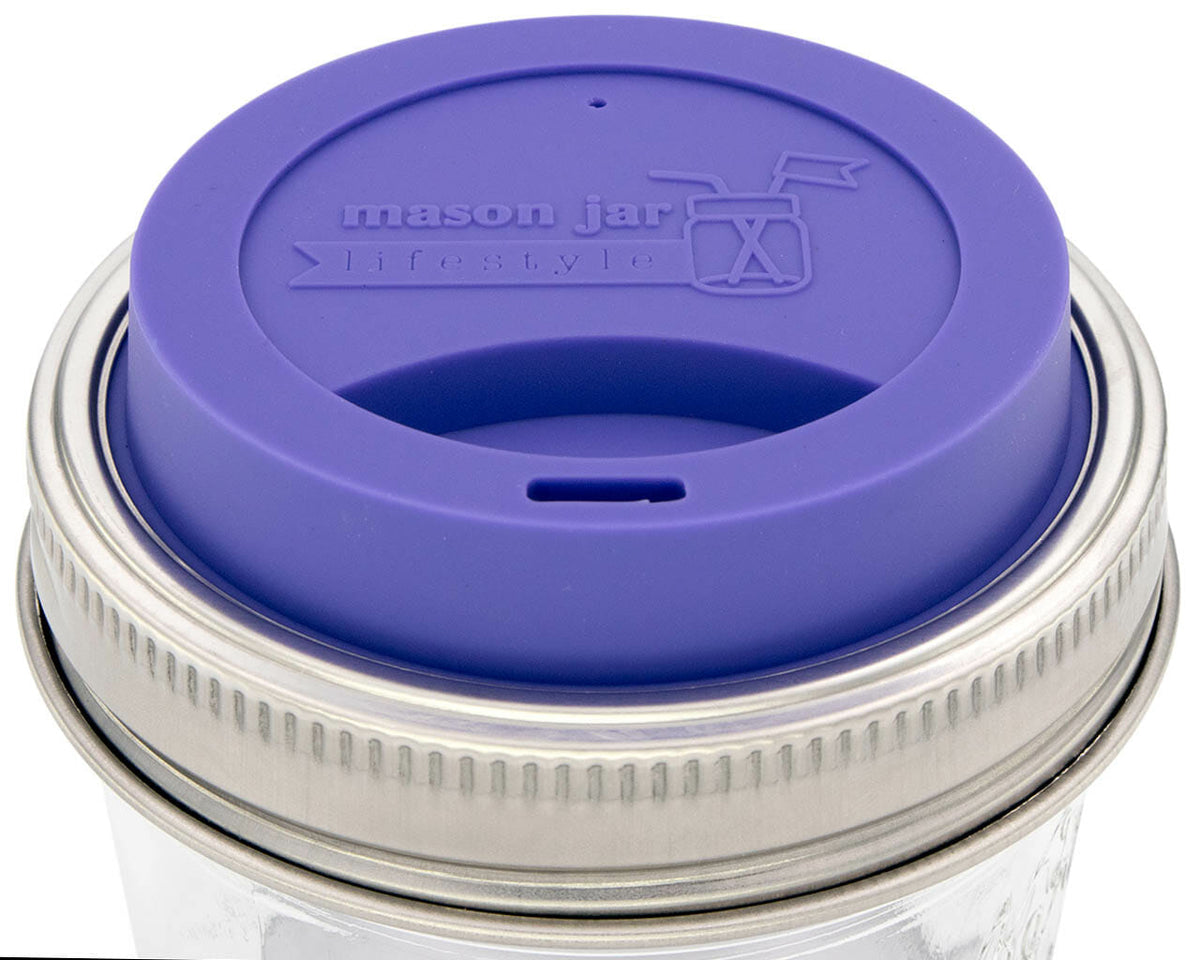 Mason Jar Lifestyle zero waste starter kit with silicone drinking lid, stainless steel band, for wide-mouth mason jars in violet.