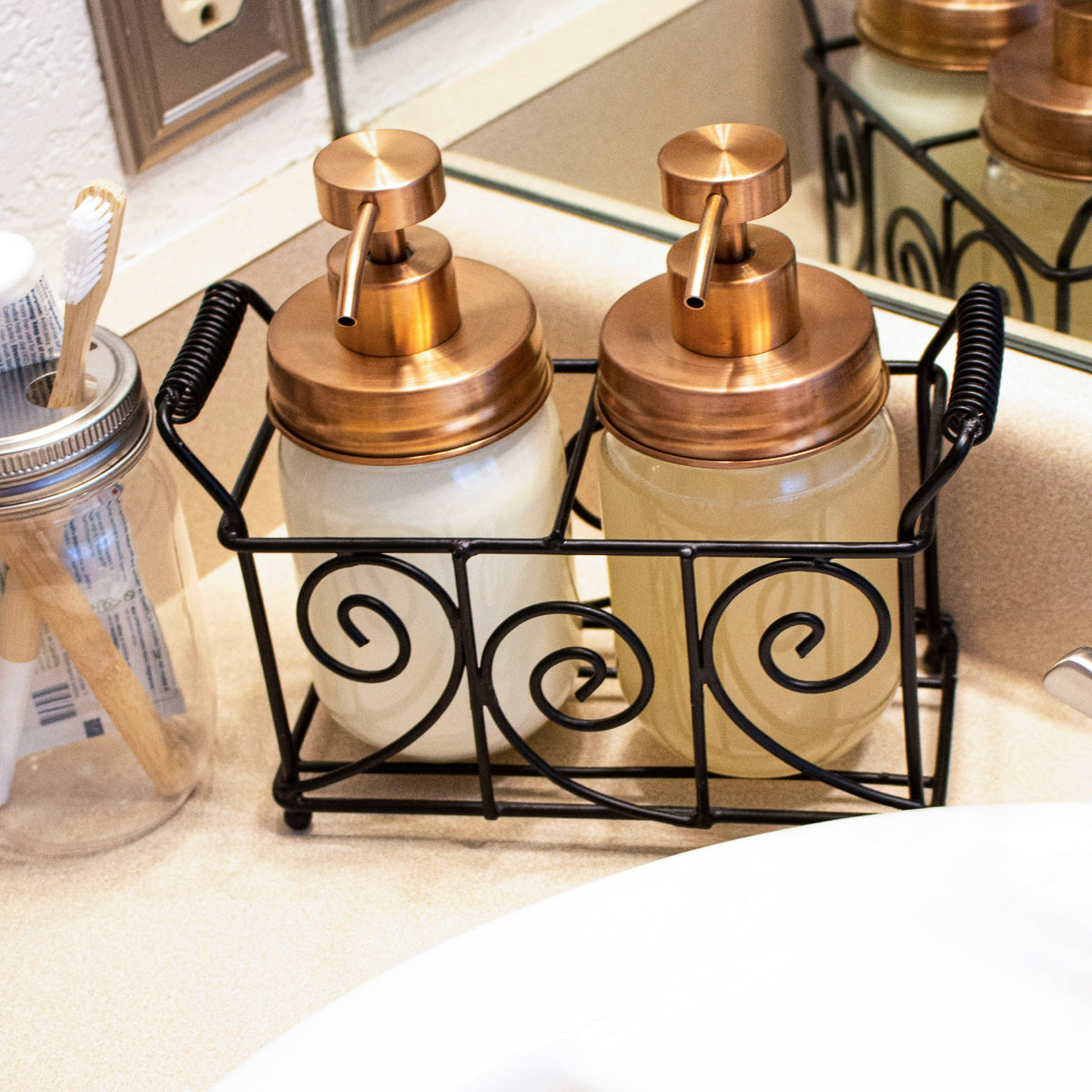 Rose gold soap pump lid kit for regular mouth Mason jars, reusable and refillable soap dispenser for bathroom or kitchen use.