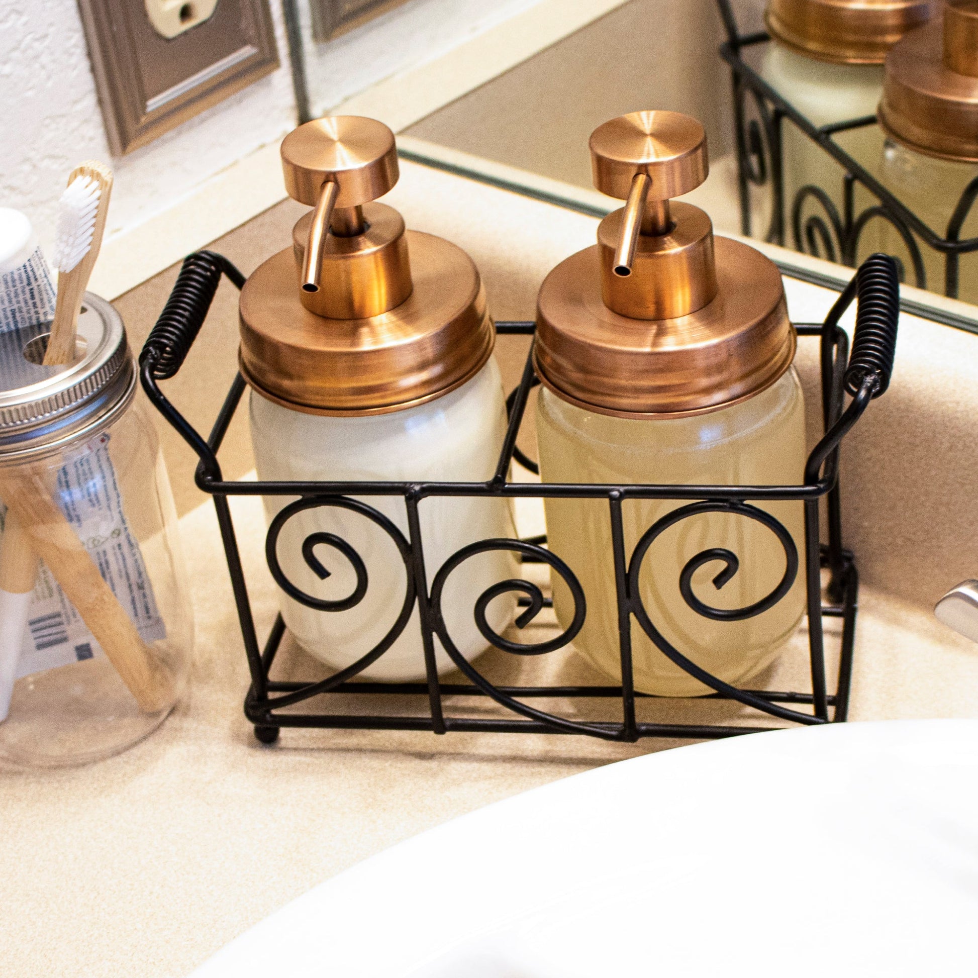 Rose gold soap pump lid kit for regular mouth Mason jars, reusable and refillable soap dispenser for bathroom or kitchen use.