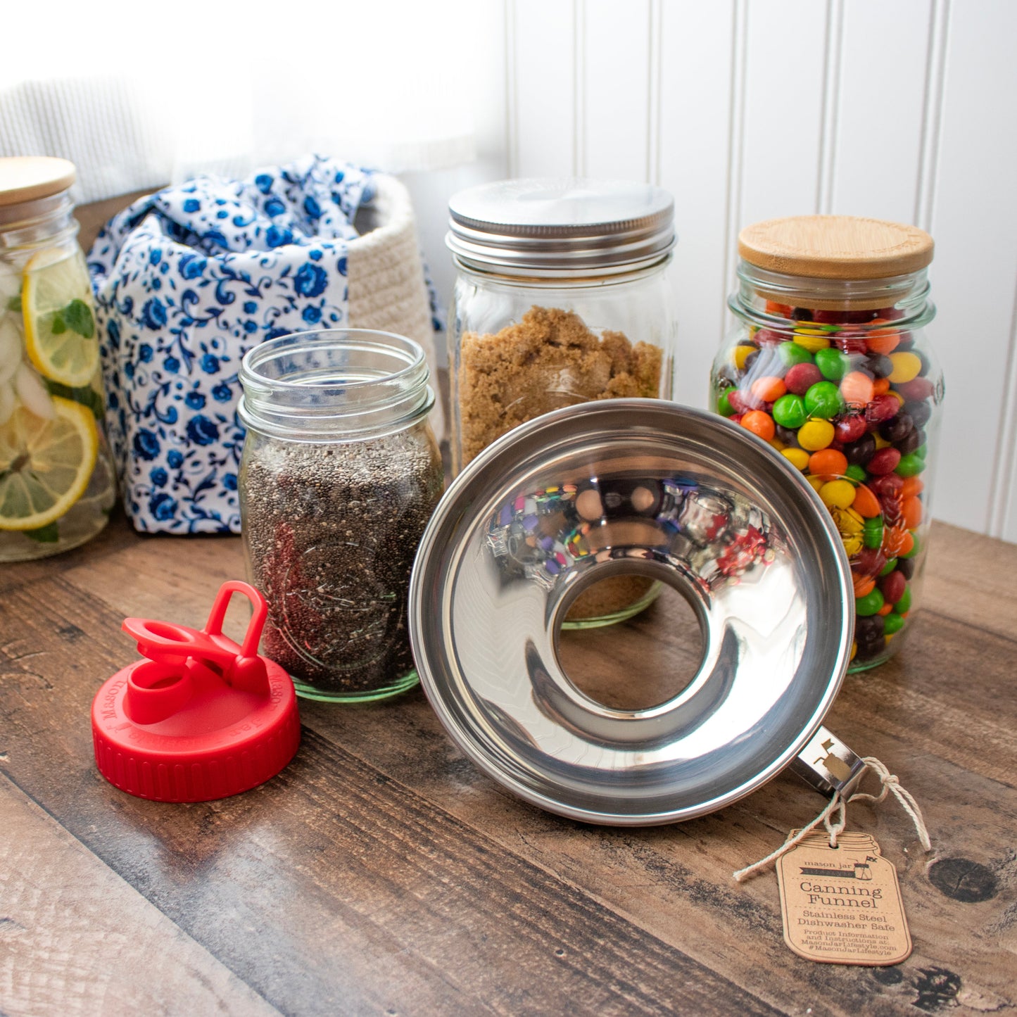 Stainless steel canning funnel for mason jars, ideal for transferring grains, flour, sugar, or baking ingredients.