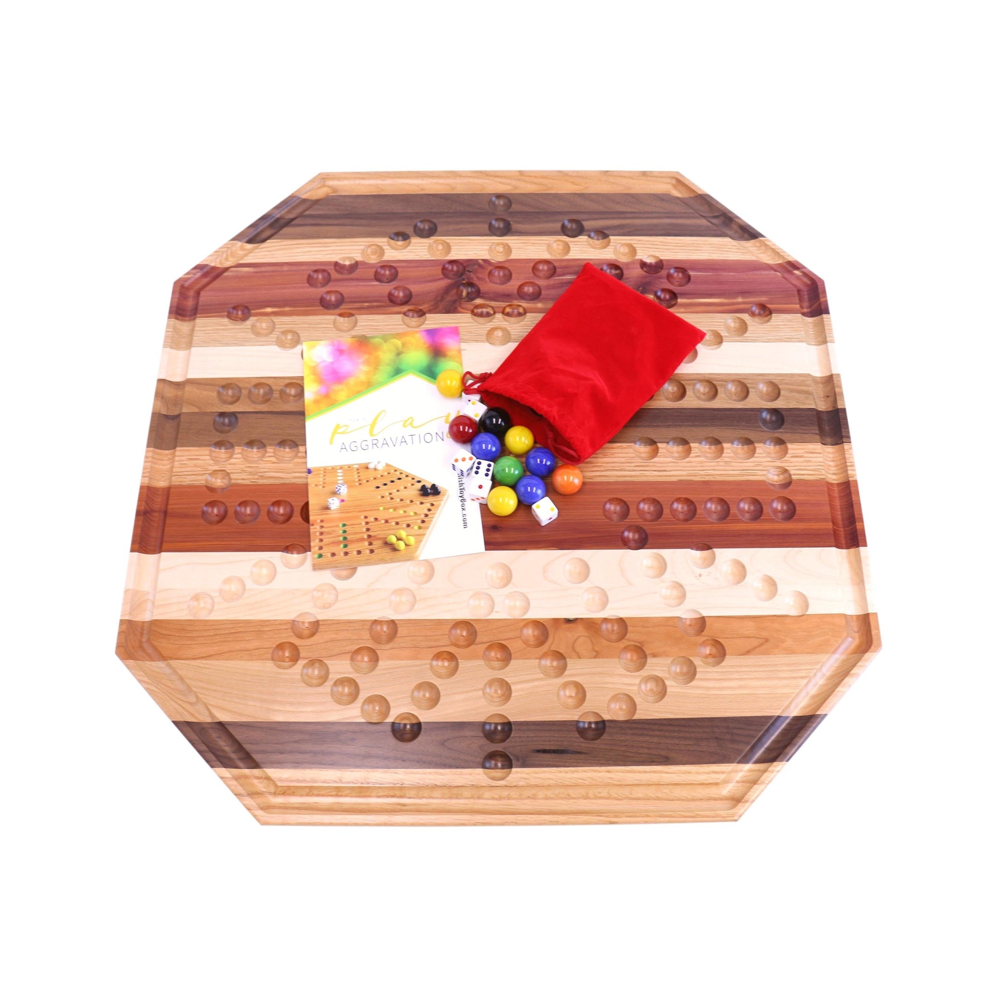 Multi-wood Aggravation marble game board set, 24-inch wide, with colorful marbles and wooden game pieces on a smooth surface.