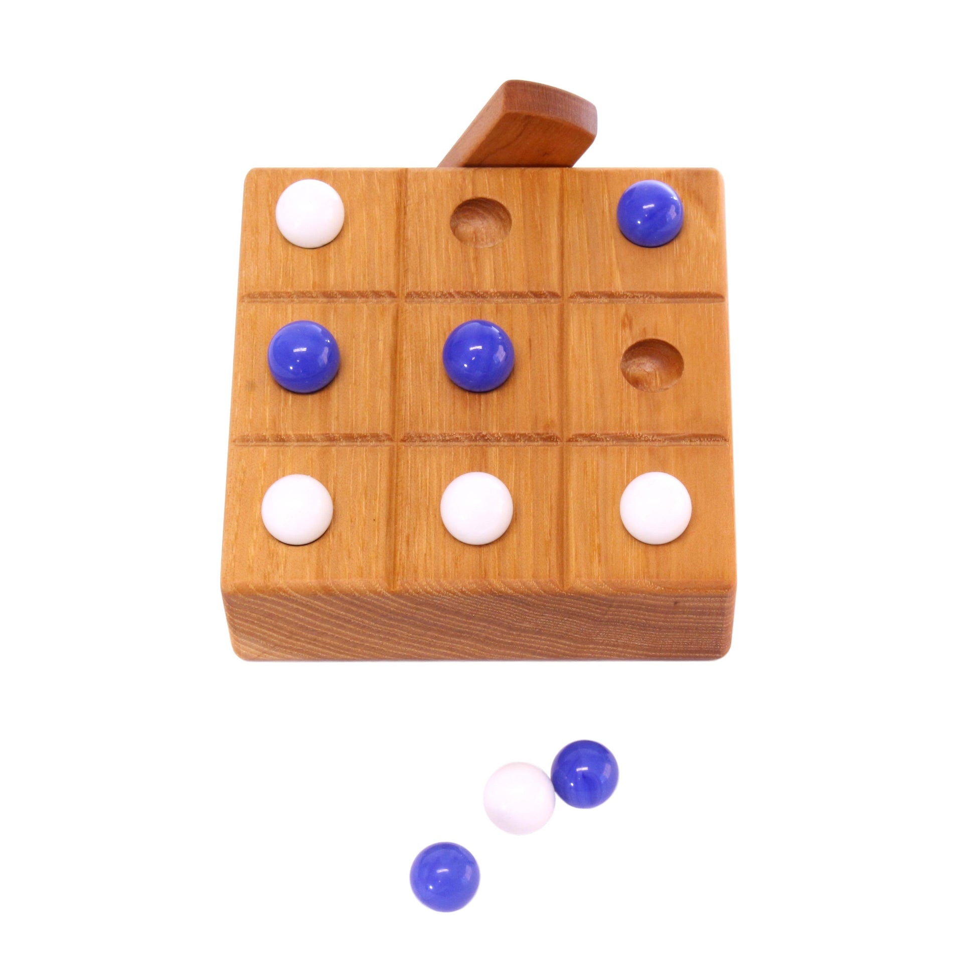 Wooden Tic Tac Toe game with marble storage, handcrafted AmishToyBox.com wooden toy featuring a classic design and built-in marble compartment.